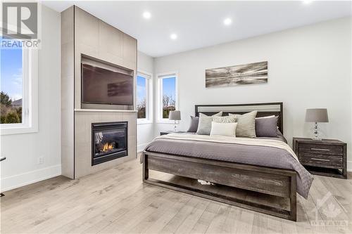 475 Lockmaster Crescent, Ottawa, ON - Indoor Photo Showing Bedroom With Fireplace