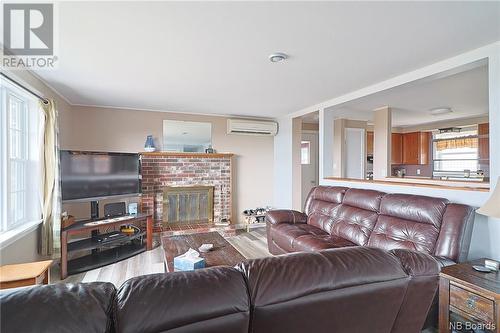 12 Norwood Road, Gagetown, NB - Indoor Photo Showing Living Room With Fireplace
