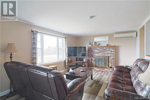 12 Norwood Road, Gagetown, NB - Indoor Photo Showing Living Room With Fireplace
