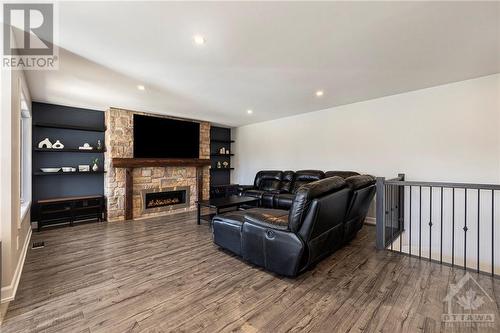 4 Merkley Place, Morewood, ON - Indoor With Fireplace