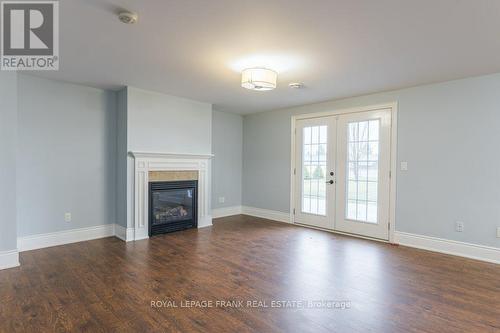 19 Jean Davey Road, Hamilton Township, ON - Indoor Photo Showing Living Room With Fireplace