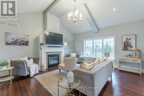 19 Jean Davey Road, Hamilton Township, ON - Indoor Photo Showing Living Room With Fireplace