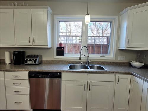 62 Dufferin Avenue W, Portage La Prairie, MB - Indoor Photo Showing Kitchen With Double Sink