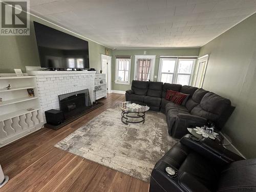 120 Government Rd W, Kirkland Lake, ON - Indoor Photo Showing Living Room With Fireplace