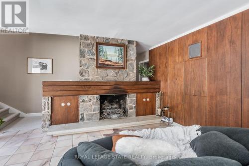 79 Amelia Street, Hamilton, ON - Indoor Photo Showing Living Room With Fireplace
