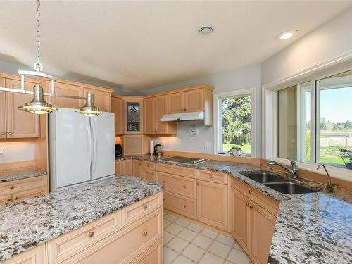 501 Arbutus Bay Rd, Fanny Bay, BC - Indoor Photo Showing Kitchen With Double Sink