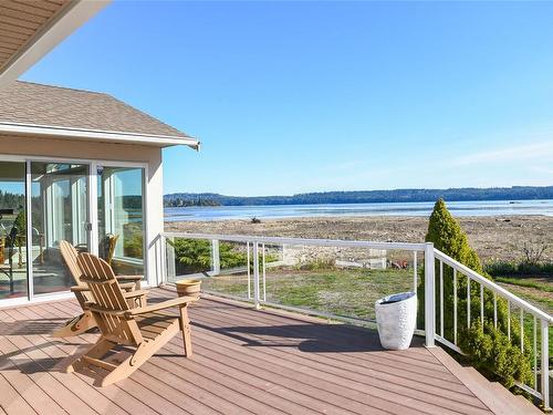 501 Arbutus Bay Rd, Fanny Bay, BC - Outdoor With Body Of Water With Deck Patio Veranda With View With Exterior