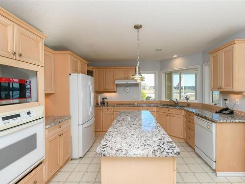 501 Arbutus Bay Rd, Fanny Bay, BC - Indoor Photo Showing Kitchen With Double Sink