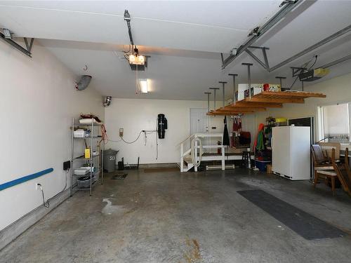 501 Arbutus Bay Rd, Fanny Bay, BC - Indoor Photo Showing Garage