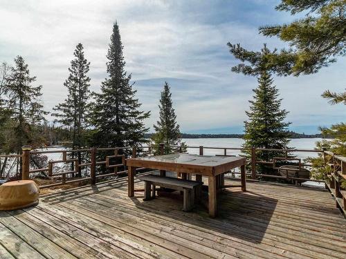 110 N Poplar Bay Road North, S Of Keewatin, ON - Outdoor With Body Of Water With Deck Patio Veranda With View
