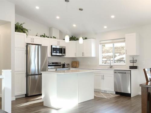 7105 Dunwaters Road, Kelowna, BC - Indoor Photo Showing Kitchen With Stainless Steel Kitchen With Upgraded Kitchen