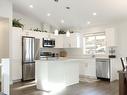 7105 Dunwaters Road, Kelowna, BC  - Indoor Photo Showing Kitchen With Stainless Steel Kitchen With Upgraded Kitchen 