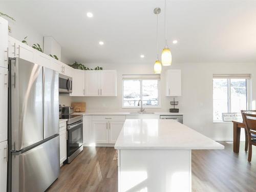 7105 Dunwaters Road, Kelowna, BC - Indoor Photo Showing Kitchen With Stainless Steel Kitchen With Upgraded Kitchen