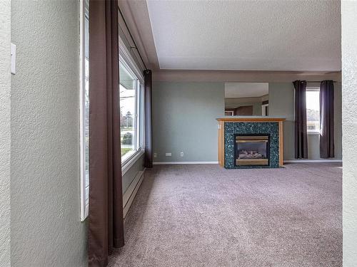 3154 Wascana St, Saanich, BC - Indoor Photo Showing Other Room With Fireplace