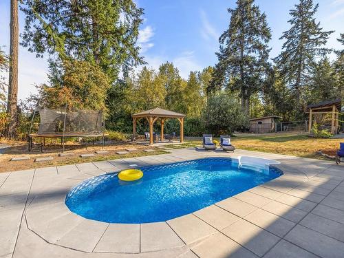 4821 Elk Rd, Saanich, BC - Outdoor With In Ground Pool With Backyard