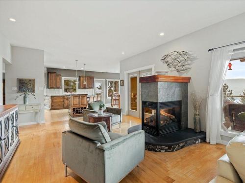 9143 Tronson Road, Vernon, BC - Indoor Photo Showing Living Room With Fireplace