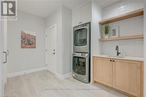 91 Allister Dr, Middlesex Centre, ON - Indoor Photo Showing Laundry Room