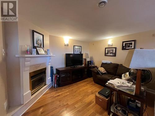 29-33 Motion Drive, Torbay, NL - Indoor Photo Showing Living Room With Fireplace