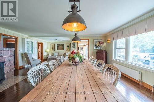 8 Manor Rd, Kawartha Lakes, ON - Indoor Photo Showing Dining Room With Fireplace