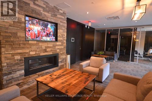 #1113 -1235 Richmond St, London, ON - Indoor Photo Showing Living Room With Fireplace
