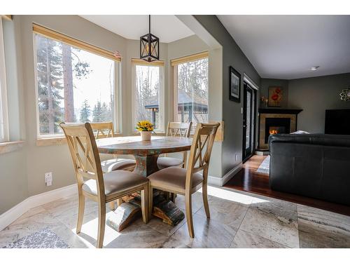 3071 Heddle Road, Nelson, BC - Indoor Photo Showing Dining Room With Fireplace