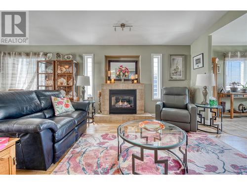 6925 Meadows Drive, Oliver, BC - Indoor Photo Showing Living Room With Fireplace