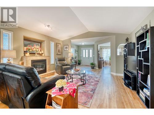 6925 Meadows Drive, Oliver, BC - Indoor Photo Showing Living Room With Fireplace