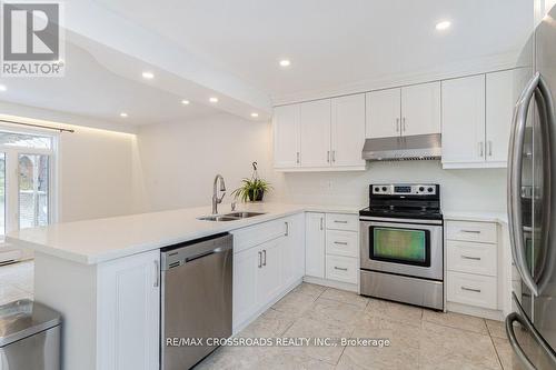 65 Ames Circ, Toronto, ON - Indoor Photo Showing Kitchen With Double Sink