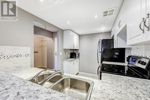 #1002 -100 Observatory Lane, Richmond Hill, ON - Indoor Photo Showing Kitchen With Double Sink