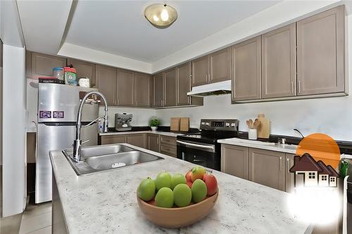 virtually staged - 755 Linden Drive|Unit #39, Cambridge, ON - Indoor Photo Showing Kitchen With Double Sink