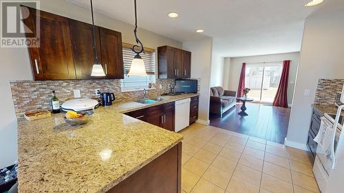 11307 89A Street, Fort St. John, BC - Indoor Photo Showing Kitchen With Double Sink