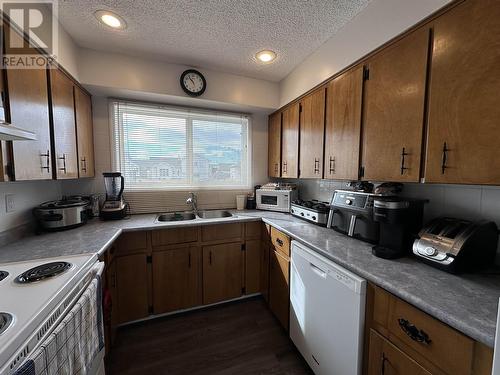 9108 112 Avenue, Fort St. John, BC - Indoor Photo Showing Kitchen With Double Sink