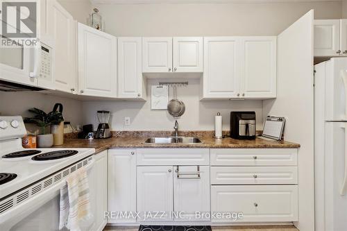 141 Agnes St, Oshawa, ON - Indoor Photo Showing Kitchen With Double Sink