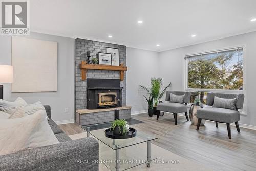 709 Trinity St, Innisfil, ON - Indoor Photo Showing Living Room With Fireplace