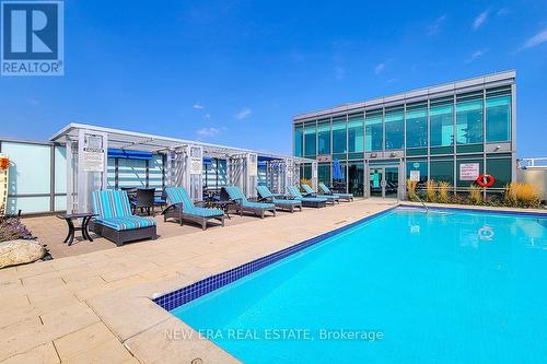 #323 -11 Bronte Rd, Oakville, ON - Outdoor With In Ground Pool