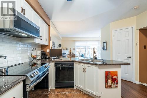 #32 -2025 Cleaver Ave, Burlington, ON - Indoor Photo Showing Kitchen With Double Sink
