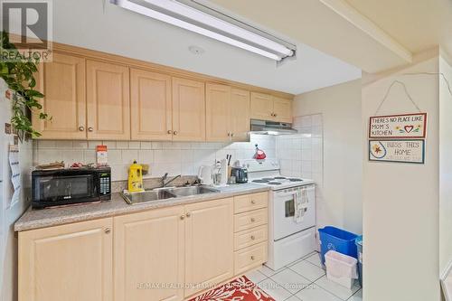126 Anthony Rd, Toronto, ON - Indoor Photo Showing Kitchen With Double Sink