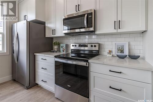 106 Haverstock Crescent, Saskatoon, SK - Indoor Photo Showing Kitchen With Stainless Steel Kitchen With Upgraded Kitchen