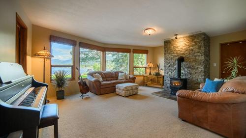 102 Sandner Rd, Christina Lake, BC - Indoor Photo Showing Living Room With Fireplace