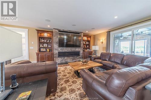3000 South Talbot, Tecumseh, ON - Indoor Photo Showing Living Room With Fireplace