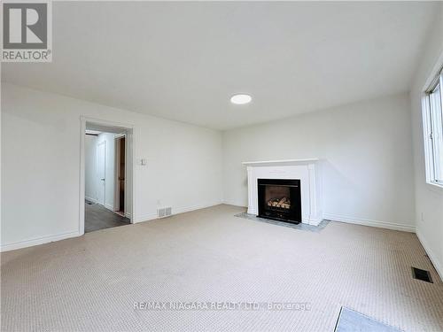 27 Tremont Drive, St. Catharines, ON - Indoor Photo Showing Other Room With Fireplace