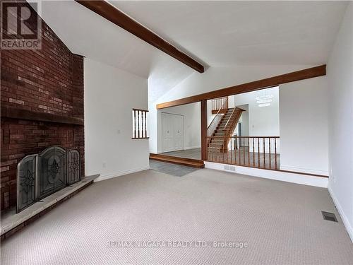 27 Tremont Drive, St. Catharines, ON - Indoor Photo Showing Other Room With Fireplace