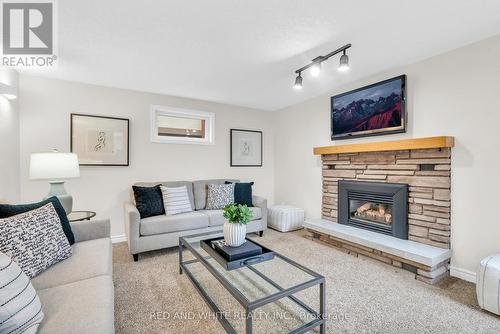 390 Krug St, Kitchener, ON - Indoor Photo Showing Living Room With Fireplace