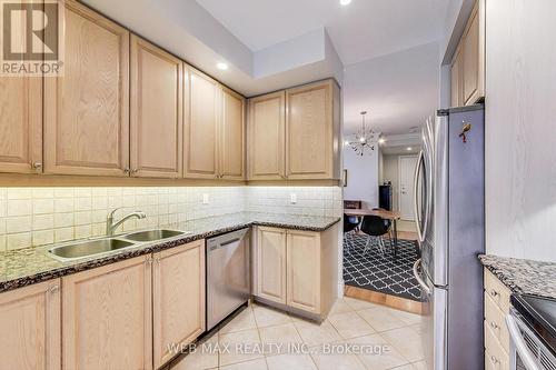 2318 - 5233 Dundas Street W, Toronto, ON - Indoor Photo Showing Kitchen With Double Sink