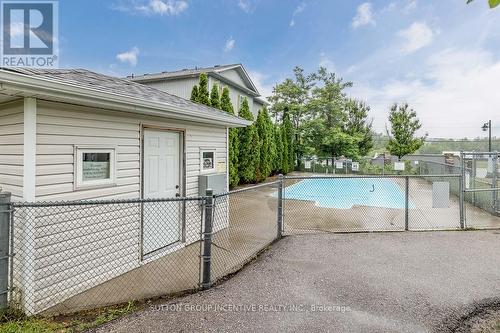 #121 -800 West Ridge Blvd, Orillia, ON - Outdoor With In Ground Pool With Exterior