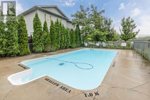 #121 -800 West Ridge Blvd, Orillia, ON - Outdoor With In Ground Pool With Backyard