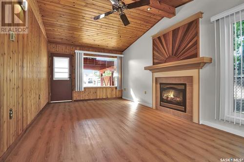 183 Poplar Lane, Wee Too Beach, SK - Indoor Photo Showing Living Room With Fireplace