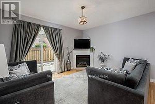 48 Braden Way, Vaughan, ON - Indoor Photo Showing Living Room With Fireplace