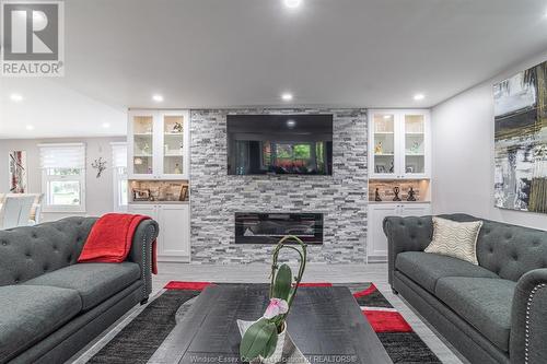 224 Caruhel, Lakeshore, ON - Indoor Photo Showing Living Room With Fireplace