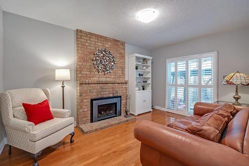 1557 Princeton Crescent, Oakville, ON - Indoor Photo Showing Living Room With Fireplace